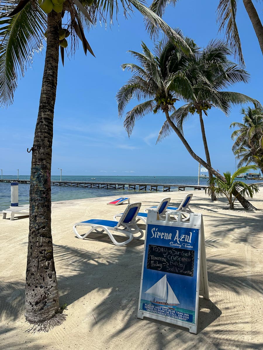 Sign for Sirena Azul sailboat on beach