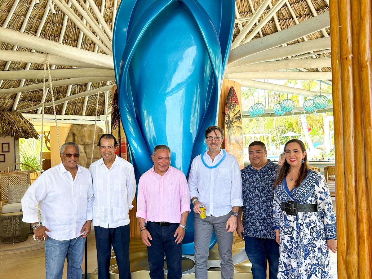 VIPs in front of the flip flop at Margaritaville Belize