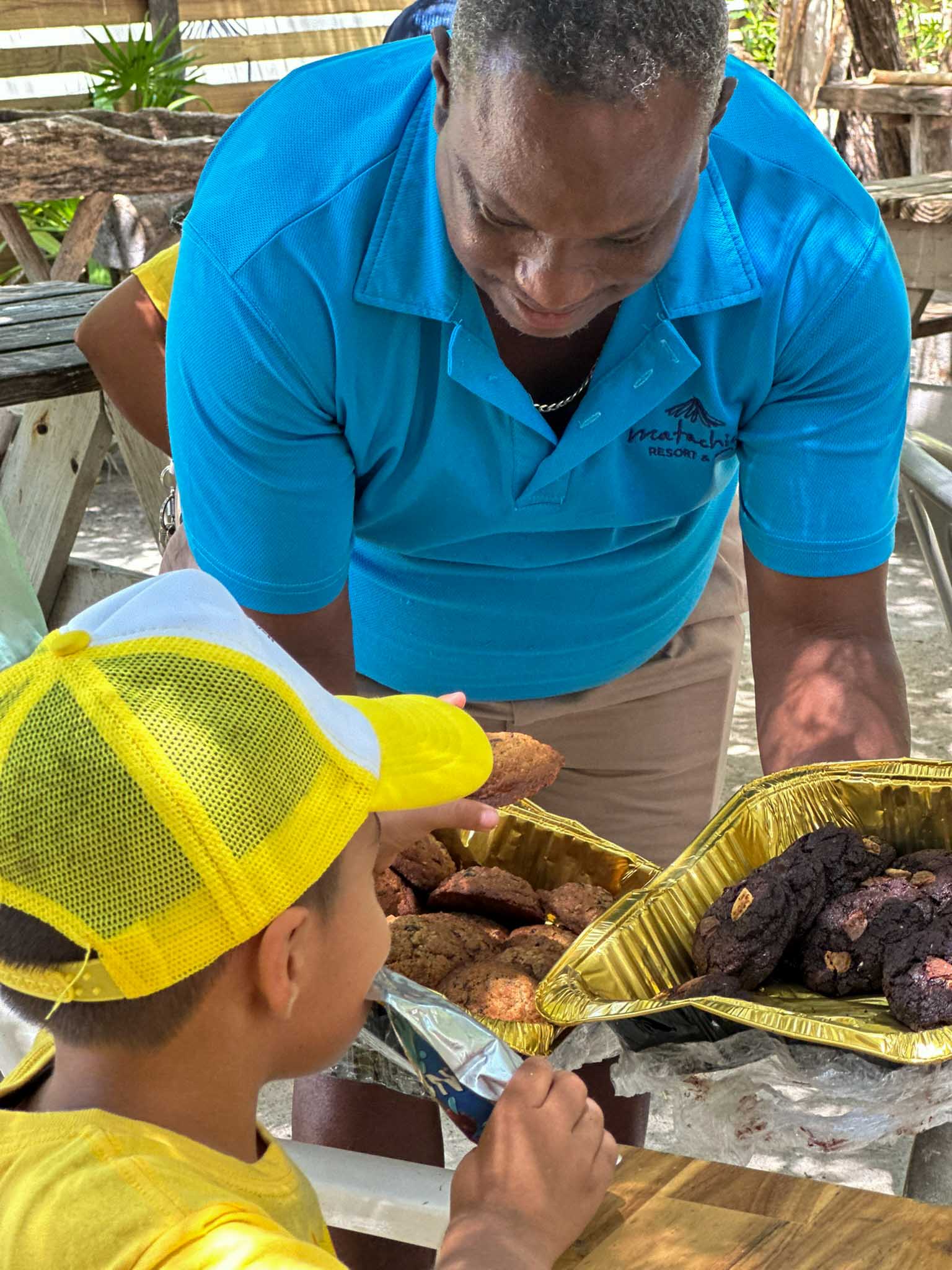 Matachica handing out cookies to the kids
